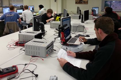 Students using the SMART robots in a lab setting.