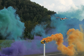 RC airplane doing a flow visualization test in smoke