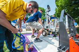student loading robot at NASA Centennial Challenge