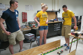 Students working on a small robot